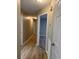 Hallway featuring wood floors and doors leading to other rooms at 42 Grant Nw Dr, Cartersville, GA 30121