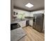 Bright kitchen with white cabinets, stainless steel appliances, and granite countertops at 42 Grant Nw Dr, Cartersville, GA 30121