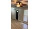 Living Room with light wood floors, a ceiling fan and a front door at 42 Grant Nw Dr, Cartersville, GA 30121