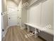 Convenient mudroom entrance with a bench and storage; offering functionality and style at 5722 Urban Village Way # 8, Tucker, GA 30084