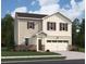Charming two-story home features a two car garage and neutral siding at 7731 Sudbury Cir, Covington, GA 30014