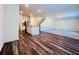 Open-concept living space with views of the kitchen at 7731 Sudbury Cir, Covington, GA 30014
