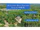 Aerial view of two properties totaling four acres in Mableton, GA at 922 Pebblebrook Se Rd, Mableton, GA 30126