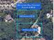 Aerial view of two large, wooded properties totaling four acres at 922 Pebblebrook Se Rd, Mableton, GA 30126
