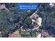 Aerial view of a two-acre property with home in Mableton, GA at 922 Pebblebrook Se Rd, Mableton, GA 30126