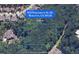 Aerial view of a two-acre wooded property in Mableton, GA at 922 Pebblebrook Se Rd, Mableton, GA 30126