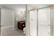 Bathroom with vanity, toilet, and glass door shower, offering functionality and style at 922 Pebblebrook Se Rd, Mableton, GA 30126