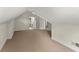 This carpeted bedroom features multiple doorways leading to a connected bath and other rooms at 922 Pebblebrook Se Rd, Mableton, GA 30126