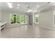 Bright bonus room with tile floors, recessed lighting, ceiling fan and multiple windows at 922 Pebblebrook Se Rd, Mableton, GA 30126