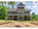 Spacious home with multiple screened porches and levels, plus a fire pit area for outdoor enjoyment at 922 Pebblebrook Se Rd, Mableton, GA 30126