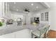 Bright kitchen featuring granite countertops, stainless steel appliances, and white cabinets at 922 Pebblebrook Se Rd, Mableton, GA 30126