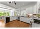 Bright kitchen featuring granite countertops, stainless steel appliances, and white cabinets at 922 Pebblebrook Se Rd, Mableton, GA 30126