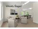 Bright, virtually staged living area features neutral colors, comfortable seating, and a pool table for entertainment at 922 Pebblebrook Se Rd, Mableton, GA 30126