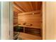Aromatic sauna interior with wood paneling and benches, promising relaxation and wellness at 922 Pebblebrook Se Rd, Mableton, GA 30126