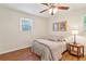 Comfortable bedroom with a ceiling fan, natural light, and warm decor at 3344 Ridgecrest Dr, Powder Springs, GA 30127