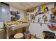 Basement workshop featuring a workbench, storage, and pegboard wall at 4842 Mcpherson Ne Dr, Roswell, GA 30075