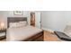 Cozy bedroom with hardwood floors and comfortable furnishings at 537 Winton Ne Ter, Atlanta, GA 30308