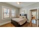 Bedroom featuring hardwood floors and natural light at 537 Winton Ne Ter, Atlanta, GA 30308