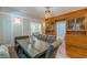 Charming dining room boasts a rustic wood table, built-in cabinets, and a modern chandelier at 537 Winton Ne Ter, Atlanta, GA 30308