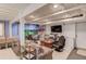Finished basement with recreational area, tv and sofa; ideal for entertaining or relaxing at 1588 Peachtree Cir, Lawrenceville, GA 30043