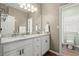 Bathroom featuring double vanity, granite countertops, and tile flooring at 4445 Ansley Ln, Cumming, GA 30040