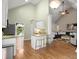 Modern kitchen with bar seating, stylish countertops, and open layout at 4445 Ansley Ln, Cumming, GA 30040