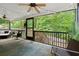 Screened-in porch features ample seating and views of the backyard, providing a relaxing outdoor space at 4445 Ansley Ln, Cumming, GA 30040
