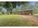 This backyard offers ample space and a serene setting, perfect for leisure and outdoor activities at 5964 W Fayetteville Rd, Atlanta, GA 30349
