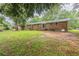 This backyard offers ample space and a serene setting, perfect for leisure and outdoor activities at 5964 W Fayetteville Rd, Atlanta, GA 30349
