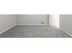 This bedroom features neutral walls and plush gray carpet at 5964 W Fayetteville Rd, Atlanta, GA 30349