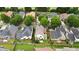 Aerial view of backyard with fence, green grass, and trees at 663 Warm Springs Ct, Loganville, GA 30052