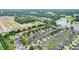 Aerial image of new residential area, highlighting the community layout and surrounding landscape at 663 Warm Springs Ct, Loganville, GA 30052