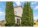 This home's backyard features mature trees that give backyard privacy and a natural border to the property at 663 Warm Springs Ct, Loganville, GA 30052