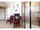 Main bathroom with fireplace, shower and tile floors at 663 Warm Springs Ct, Loganville, GA 30052