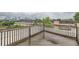 This rooftop deck has wooden floors and railings and views of the cityscape in the background at 791 Wylie Se St # 410, Atlanta, GA 30316