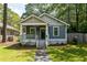 Charming craftsman-style home with a welcoming front porch and freshly landscaped yard at 23 Clifton Ne St, Atlanta, GA 30317