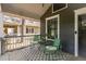 Inviting front porch with seating area, ideal for relaxing and enjoying the neighborhood at 23 Clifton Ne St, Atlanta, GA 30317