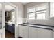 Charming kitchen with blue lower cabinets, white subway tile, and stainless steel appliances at 23 Clifton Ne St, Atlanta, GA 30317