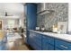 Contemporary kitchen with custom cabinetry, granite countertops, and sleek appliances at 23 Clifton Ne St, Atlanta, GA 30317
