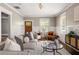 Bright and airy living room with stylish decor, ample seating, and natural light at 23 Clifton Ne St, Atlanta, GA 30317