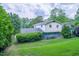 View of the home from the spacious yard at 2592 Dresden Dr, Atlanta, GA 30341