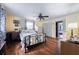 Comfortable bedroom features hardwood floors, a ceiling fan, and large closet at 2592 Dresden Dr, Atlanta, GA 30341