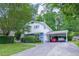 Charming two-story home with a carport and well-maintained landscaping creating a welcoming curb appeal at 2592 Dresden Dr, Atlanta, GA 30341