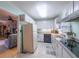 Functional kitchen with all-white cabinetry and stainless-steel appliances; offers plenty of storage and counter space at 2592 Dresden Dr, Atlanta, GA 30341