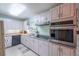 Kitchen featuring granite counters, a built-in oven, and ample cabinet space for any home chef at 2592 Dresden Dr, Atlanta, GA 30341