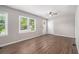 Spacious living room with ceiling fan, hardwood floors and abundant natural light at 3456 Maryvale Dr, Decatur, GA 30032