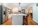 Bright kitchen features a large island, stainless steel appliances, and a seamless flow to other living spaces at 5357 Highway 81, Loganville, GA 30052