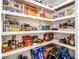 Walk-in pantry features organized shelving, providing ample storage space for food and household items at 5357 Highway 81, Loganville, GA 30052