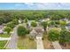 Charming home with a well-manicured lawn, mature trees, and two-car garage at 216 Toonigh Way, Canton, GA 30115