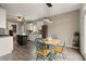 Bright dining area with a modern light fixture and eat-in dining area at 216 Toonigh Way, Canton, GA 30115